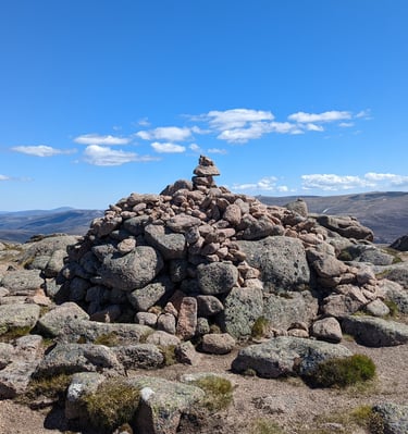 Mountain summit cairn