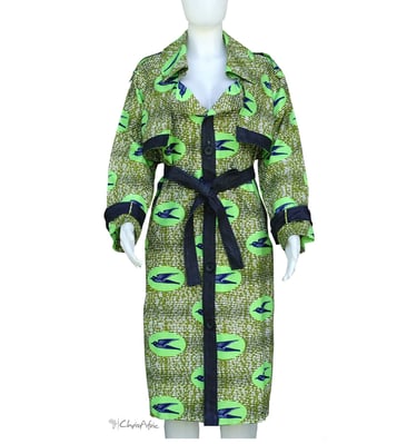 a mannequins woman's green dress with a denim belt