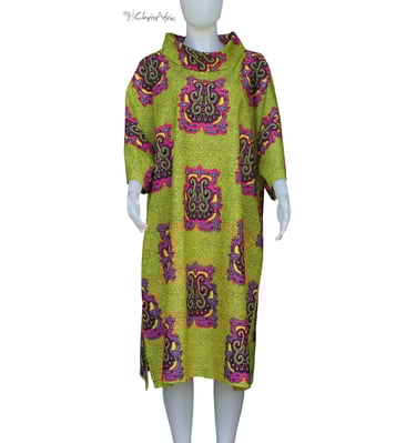 a mannequins' dress with a green and pink dress