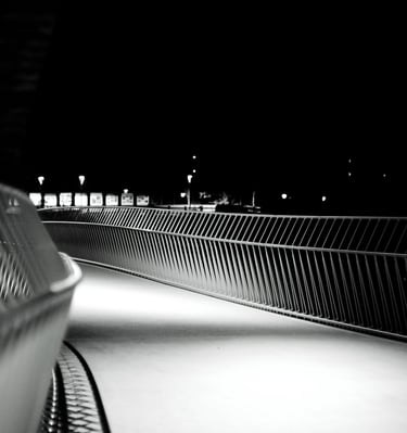 a skateboarder is riding his board down a ramp