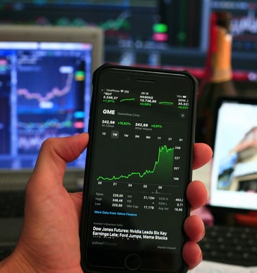 phone showing investing chart symbolizing market volatility