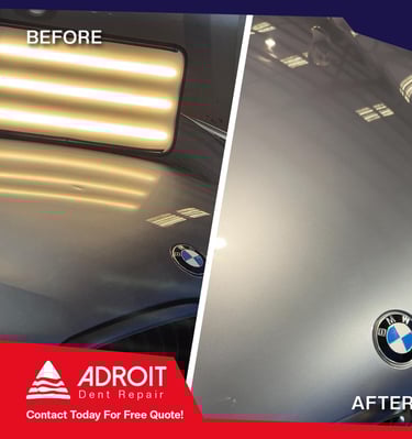 Hood dent on BMW 550i, aluminium panel