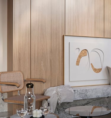 a living room with a chair and a table
