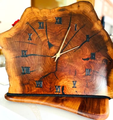 Edged wooden slab clock for table or shelf.
