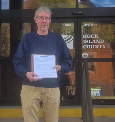 Steven Rugh at the County Office to turn in his Petition Packet.