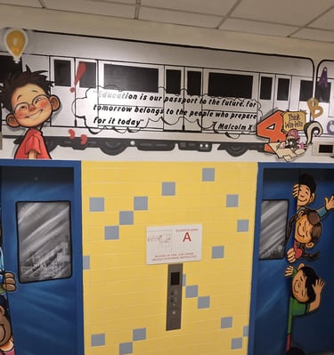 The image of a train and children created to celebrate the school's 10th anniversary.