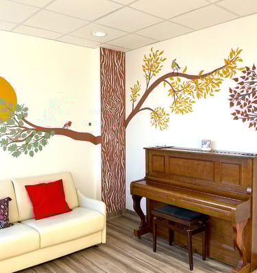 fresque arbre oiseaux salon famille hôpital cancer Baclesse Normandie Caen muraliste peinture murs