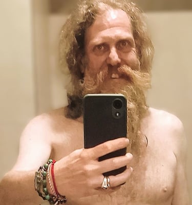Axel TheBeast posing for a mirror selfie