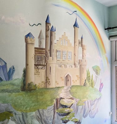 Side angle of kid’s mural with a fantasy castle showcasing its position in context to the layout of the room.