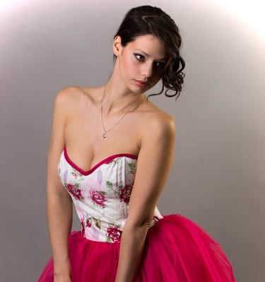 a beautiful woman in a red, white and pink special dress