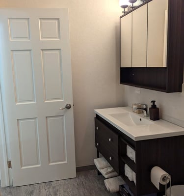 bathroom entry and sink with vanity