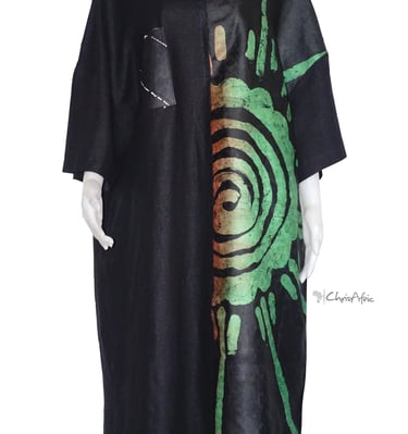 a black and white dress with a green and red tie dye dye