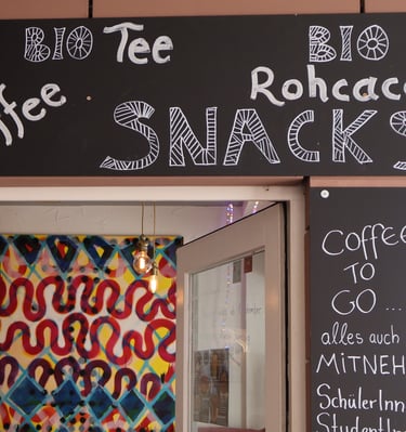 a sign that says coffee shop
