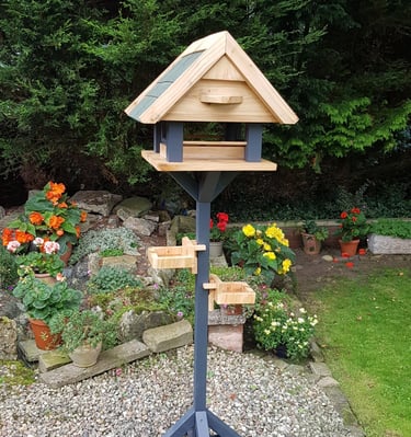 a bird table in a garden