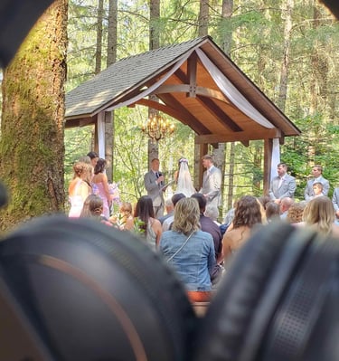 A picture of a wedding ceremony at Three Strands Farm in Lebanon, Oregon.