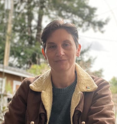 shown is Talcott Broadhead. who is white with short, dark hair & green eyes.