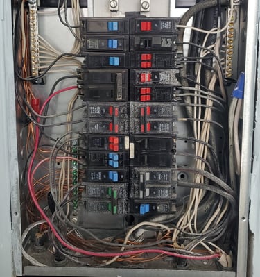 Older electrical panel in a 1970s condo. There were quite a few issues in that one! 