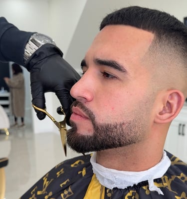 Precision scissor beard trim and shaping at Unlimited Barbershop Etobicoke.