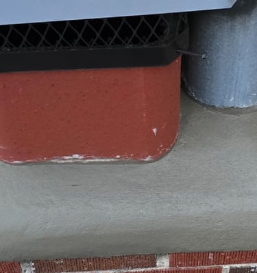 "Repairing a cracked chimney crown by Profaster Services in Des Moines."