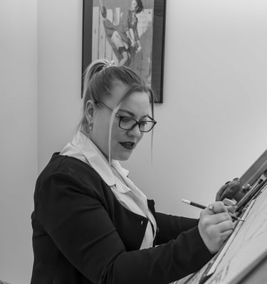 Creative portrait photoshoot with model at a drafting table in studio