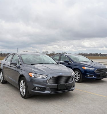 A happy family loading luggage into a minivan from our fleet, preparing for a road trip.