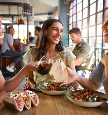 Latinas working over dinner