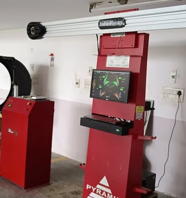 alt="3D wheel alignment and balancing machine used for car tyre servicing"