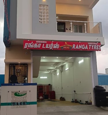 alt="Ranga Tyres storefront with service center entrance and signage"