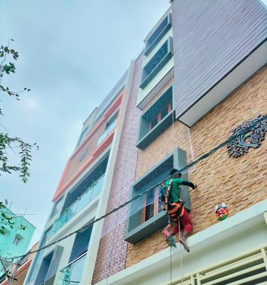 Close-up of a securely fitted balcony safety net in a modern Adyar apartment.