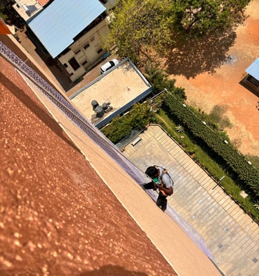 Close-up of a sturdy anti pigeon net tightly secured on a balcony in T Nagar.