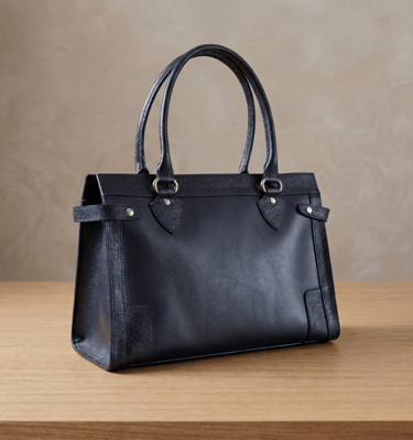 Cartera de cuero azul marino de acabado liso y semi-brillante