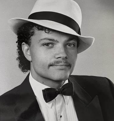 Jon Yon wearing a black and white hat