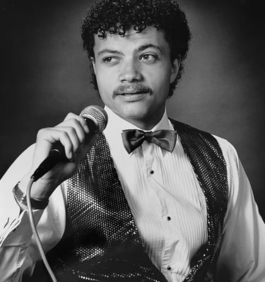 Jon Yon singing and holding a microphone