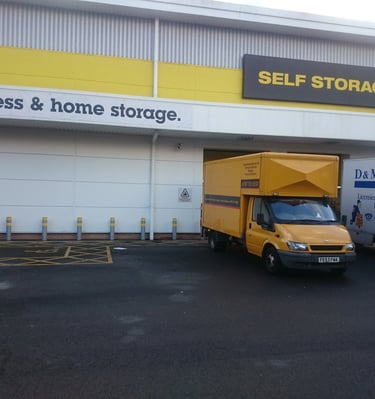 Man and van unloading at a self storage unit in Watford.