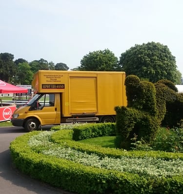 Removal van parked up after a delivery at a fairground