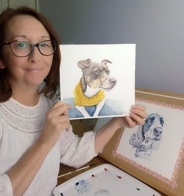 Artist showing pet portrait artworks