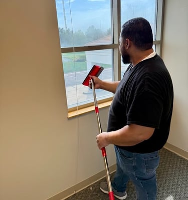 EMPLOYEE DELIVERING EXCEPTIONAL JANITORIAL SERVICES IN WICHITA FOR PRECISION CLEANING SERVICES