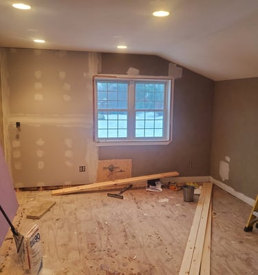 a room with a ladder and a ladder