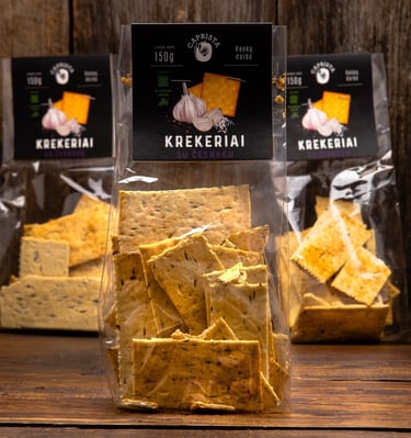 Organic crackers transparent packaging with black labels, handmade illustrations