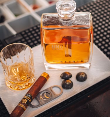 a bottle of luxury uno tequila sinfonia and cigar