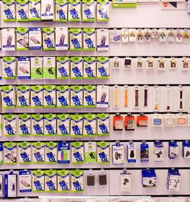 a display of electronic devices and electronics in a store