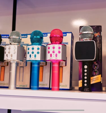 a shelf of microphones and microphones on a shelf