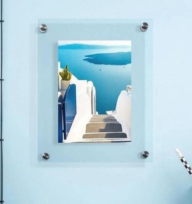Acrylic frame showing a sea view and white stairs.