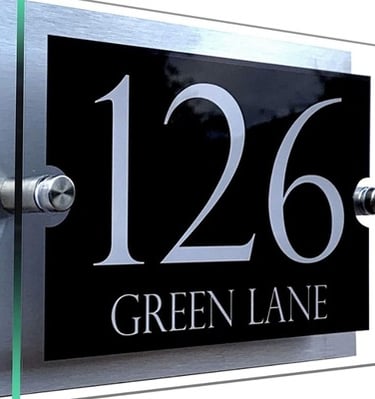Black and silver acrylic address sign with the number 126 and 'Green Lane' text.