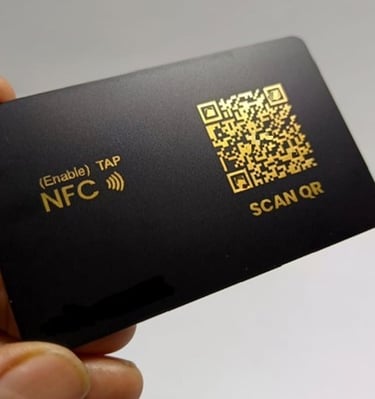 Black NFC digital business card with gold QR code and NFC tap instructions.