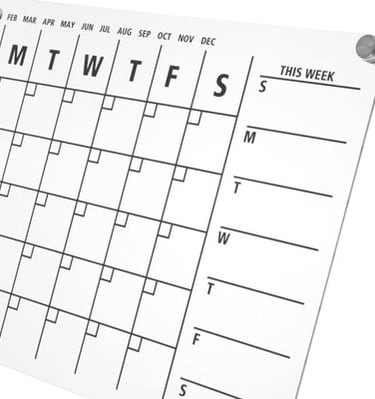 Close-up of acrylic weekly planner with standoff mounts.