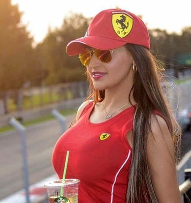 a woman in a red shirt and a red hat