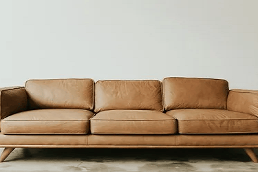 Browm Sectional leather sofa by afsar sofa repair
