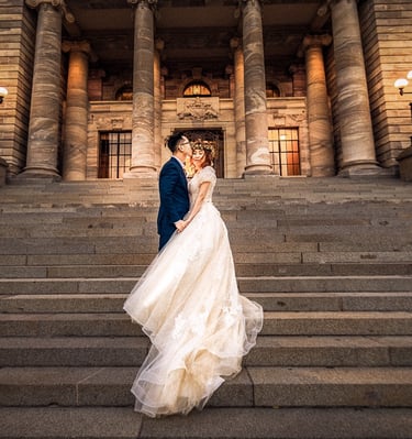 a bride and groom at New Zealand Parliament Building Beehive Wellington