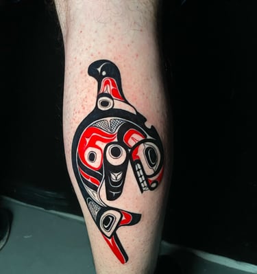  Haida tattoo a native american indian style tattoo on the leg of a man's leg